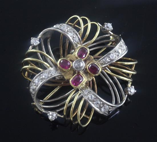 A 1980s 18ct gold, ruby and diamond set open cagework brooch, 1.75in.